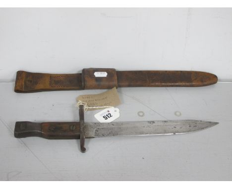 A WWI Canadian Ross Rifle Bayonet, with wood grips, muzzle ring and single edged blade, various markings including military b