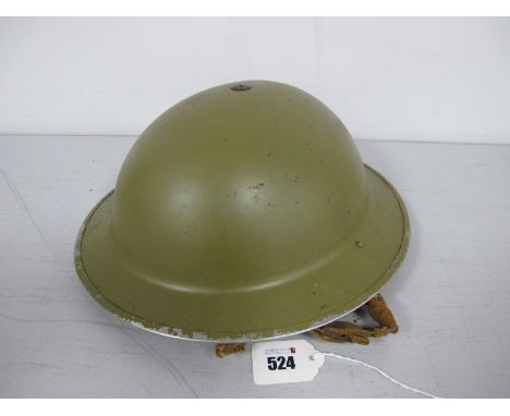 WWII British Army Brodie Helmet, with liner and remnant of chin strap, exterior repainted in olive green with added formation