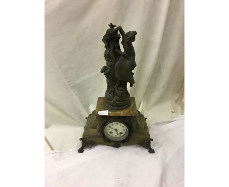A Victorian onyx mantle clock