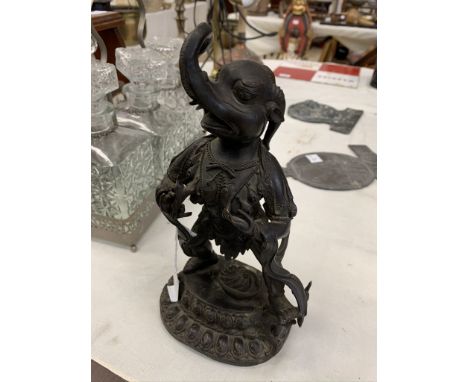 A bronze Indian statue of a deity goddess