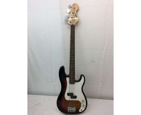 An Encore electric bass guitar