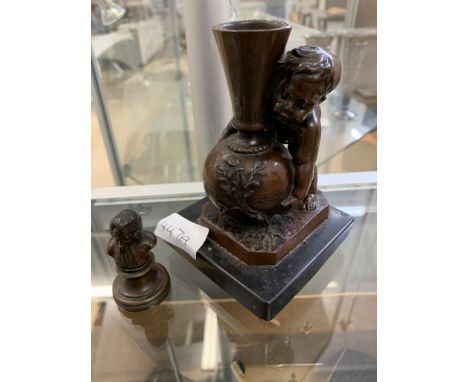 A 19th century bronze figure of putti lifting a jug  marked to base F Barbedienne together with a miniature bronze bust