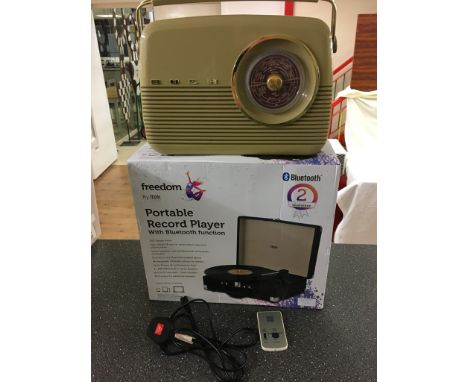 A record player; together with a radio