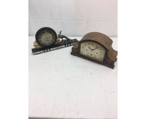 An Art Deco clock; together with one other