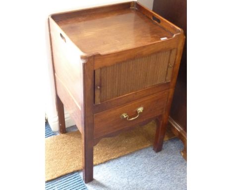 A George III period mahogany Commode, the galleried top above a sliding tambour door and single drawer below retaining origin