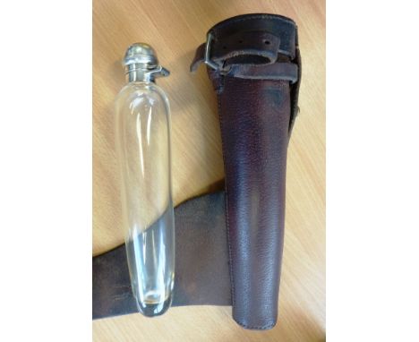 An early 20th Century leather cased clear glass Hunting Flask with a silver plated and mounted hinged lid, the leather case 2