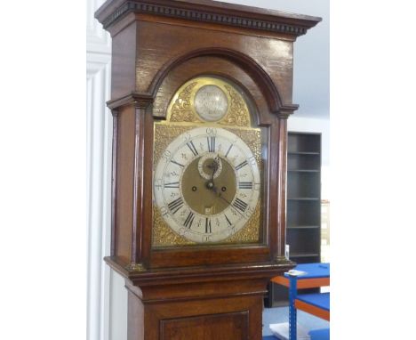 A large George III oak cased eight day Longcase Clock, the dentil cornice above a 12" broken arch dial, the arch with central