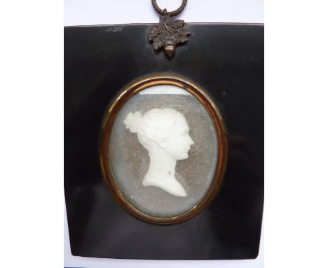 A 19th Century Parianware commemorative Plaque of Princess Charlotte, contained within a rectangular black lacquer papier-mâc