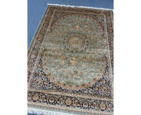 A green ground Keshan Carpet, 2.80 x 2.00