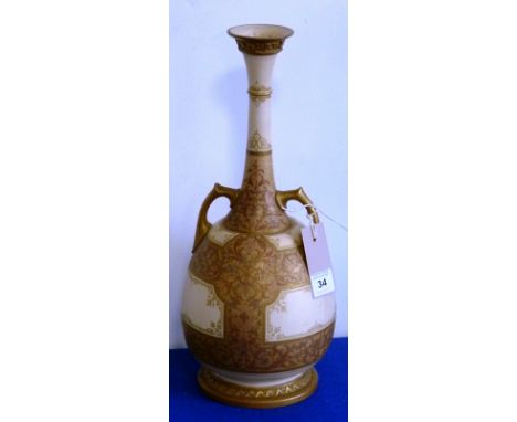 A late 19th century Worcester blush porcelain and gilt decorated two-handled Vase in the Persian style, flaring neck and the 