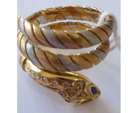 A three colour 18 carat gold "snake" Scarf Ring set with diamonds    CONDITION REPORT:  Approx.  12.7g