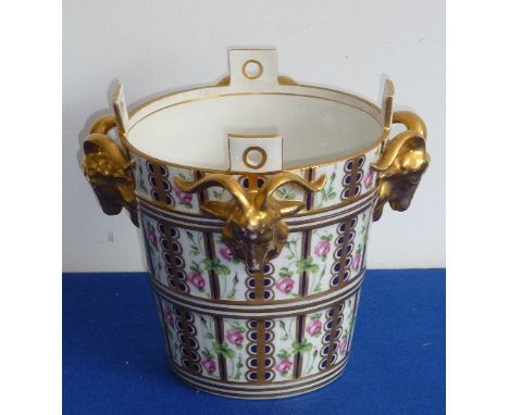 A fine Dresden porcelain Pail, the tapering cylindrical body surmounted with pierced lugs and headed with gilded ram's heads 