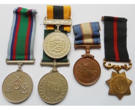 The 1947 Pakistan Independence Medal and three war medals of the Pakistan Army: the Sitara-i-Harab (1965 War) to 227043 SEP M