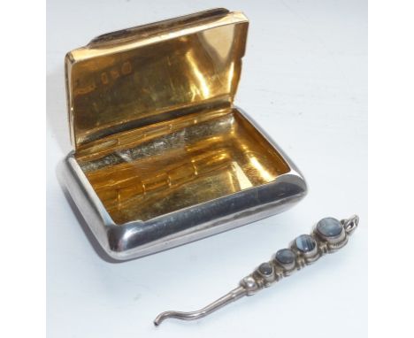 A hallmarked silver Snuff/Pill Box, the hinged top opening to reveal gilded interior with makers mark H&A, assayed Birmingham