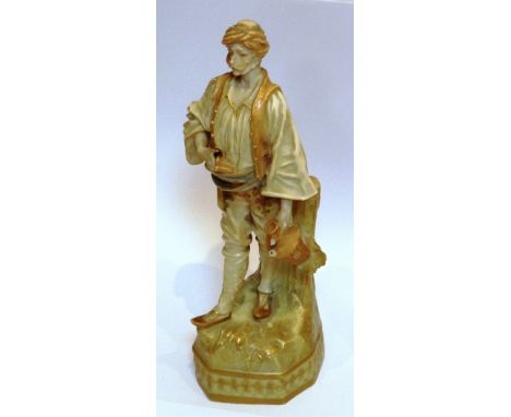 A late 19th century Austrian porcelain Model of a male figure in turban carrying an amphora (damage to handle) in his left ha