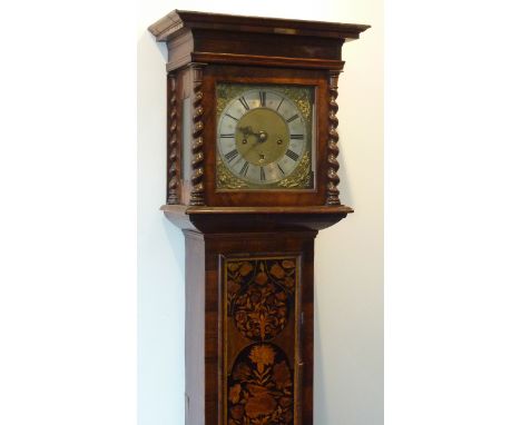 A late 17th/early 18th century walnut and marquetry cased eight-day Longcase Clock, the cross-grain moulded cornice above a 1