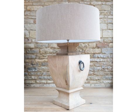 { Option of lots:  1406, 1407 } The Vega is a large and beautifully carved wooden lamp finished in a light natural stain with