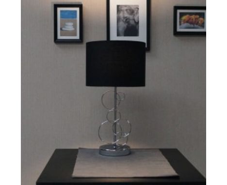 Finchley Table Lamp A striking design with a modern feel, the Finchley Table lamp has an interesting metal base with wire met