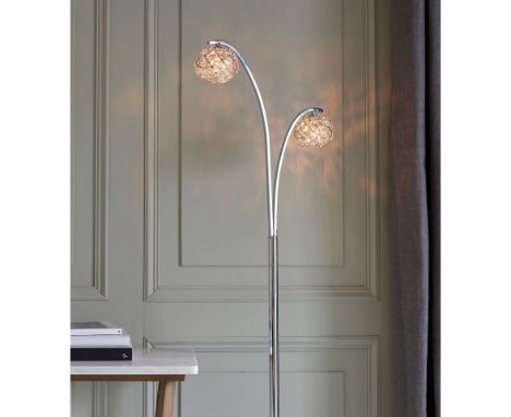 Talia Floor Lamp The Talia collection features clusters of inter-linked clear glass crystals with a polished chrome pleasted 