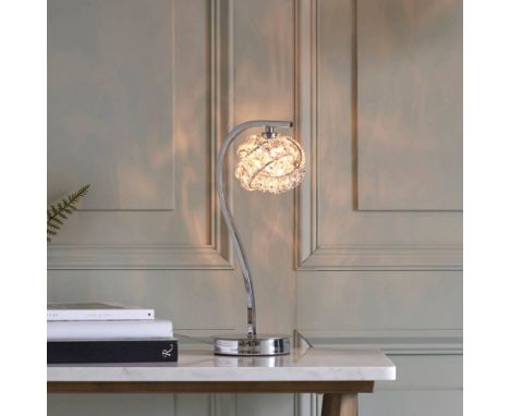 Talia Table Lamp The interwoven design of the Talia lighting collection blends crystal glass pieces with a modern finish for 