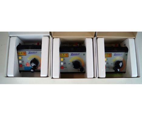 Four American power controllers/transformers
Three by M T H and one by K-Line together with some extension leads.

