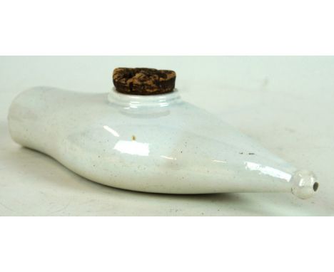 A 19th Century ceramic baby feeder
Of plain form, complete with original cork stopper, length 20cm

