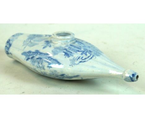 A 19th Century blue and white ceramic baby feeder
Decorated with a Willow Pattern scene, length 18cm
 CONDITION REPORT:  Ligh