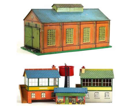 A quantity of Hornby 'O' gauge railway items 
Including an engine shed with three rail track, lacking one set of doors with t
