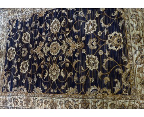 A Zeigler carpet
On a mainly blue ground, the central panel with multiple floral decoration, flanked by multiple florally dec