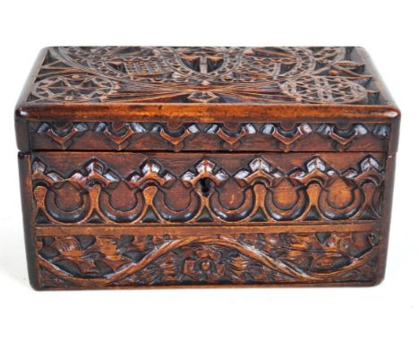 A 19th Century Scandinavian carved tea caddy
Having heavily cared floral, and gothic style decoration, the hinged cover enclo