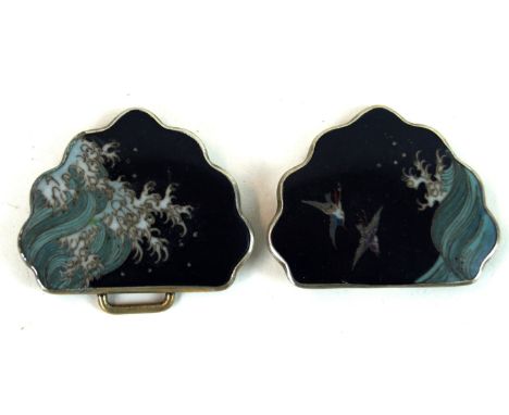 A Japanese enamelled belt buckle, late Meiji Period (1868-1912)
The scalloped two section buckle with white metal backing and