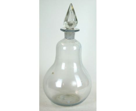 A Victorian glass apothecary chemist carboy
Modelled in the form of a pair, with pontil mark to base, and diamond cut stopper