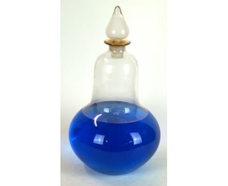A Victorian glass apothecary chemist carboy
Modelled in the form of a pair, with pontil mark to base, originally produced for