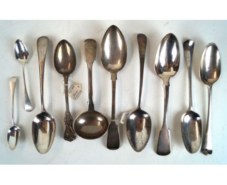 A collection of various silver spoons
Comprising; six table spoons, a sauce ladle, two teaspoons, a dessert spoon, weight com