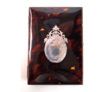 An early 20th Century Regency style tortoiseshell ladies purse
Having applied white metal vacant cartouche, length 10.5cm.
 C