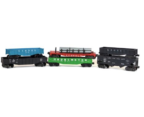 Sixteen unboxed Lionel 'O' gauge hopper, open and flat wagons 
Including pope wagon - all plastic.