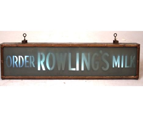 A late Victorian advertising hanging light
'Order Rowling's Milk' encased in a copper mount, with frosted glass front, 30x121