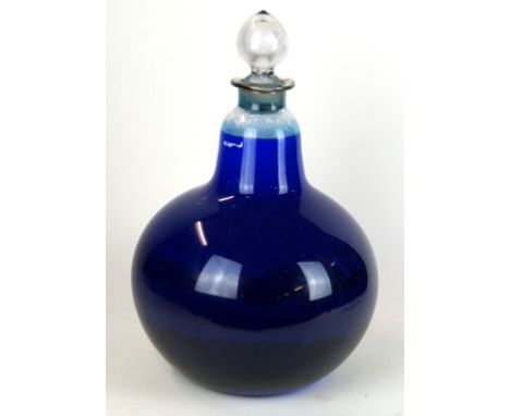 A Victorian glass apothecary chemist carboy 
Of bulbous form with cut glass stopper and blue liquid, originally produced for 