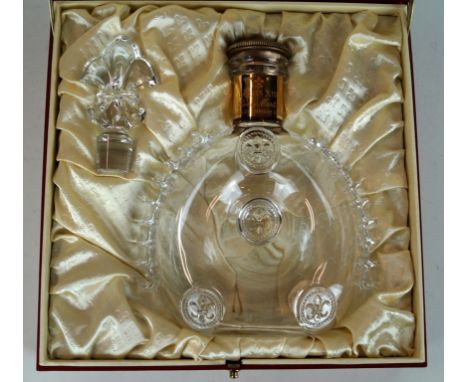 A Baccarat crystal Remy Martin Louis XIII glass decanter
Having relief decoration, numbered 0553 to base, height 21, with 23c