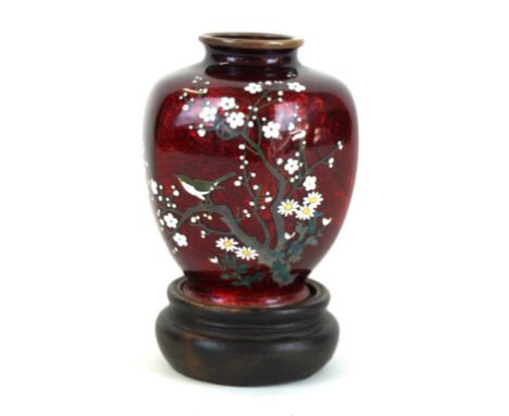 A Japanese ginbari enamel vase, early 20th Century 
Of facetted ovoid form, rising from a low spreading circular base and ext