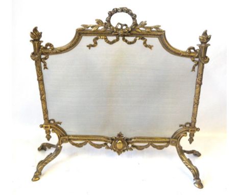 An 18th Century style cast gilt metal and mesh fire screen, 20th Century
Decorated throughout with scrolling foliage, ribbons