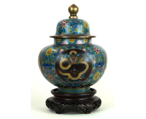 A large Chinese cloisonné vase and cover, late Qing Dynasty (1644-1912)
Of globular ovoid form, rising from a straight sided 