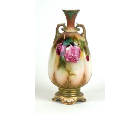 A Royal Worcester hand-painted twin handled vase
Decorated with Roses, by James Hadley, green factory marks and date code for