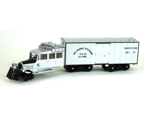 A modern unboxed MTH triple bogey articulated Rio Grande Southern US Mail motor no. 5 motorised wagon
In silver colourway.