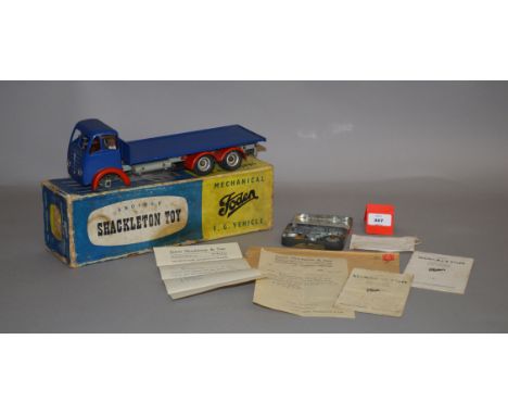 A boxed Shackleton Models mechanical  Foden FG Flatbed Truck in blue with red wheel arches, together with an envelope contain