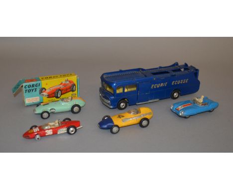 An unboxed group of Corgi Toys racing related diecast models, including an  Ecurie Ecosse Racing Car Transporter, Lotus and F