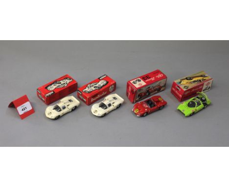 Four boxed diecast Racing Car models, Mercury #53 Alfa Romeo 33 Pininfarina and  #64 Alfa Romeo 33 Prototipo together with 2 