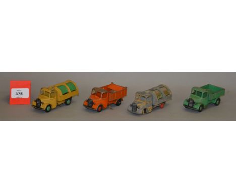 Four unboxed vintage playworn Dinky Toys diecast  models based on the Bedford 'O' series chassis, including two versions of t