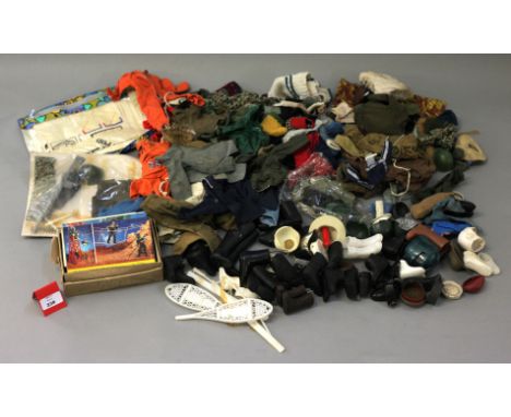 An excellent quantity of Palitoy Action Man clothing, footwear and hats, together with used decal sheets, instructions and ca