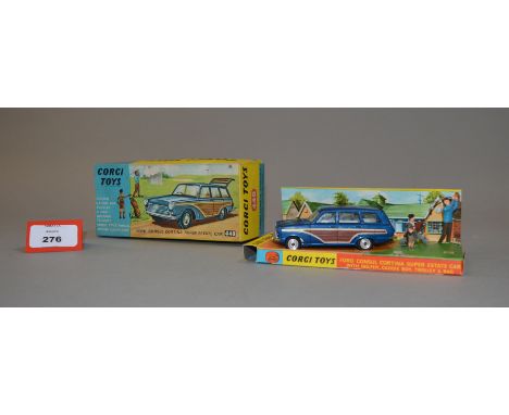 A boxed Corgi Toys 440 Ford Consul Cortina Super Estate Car in blue with golfer, caddy and gold bag, F/G as the car has some 